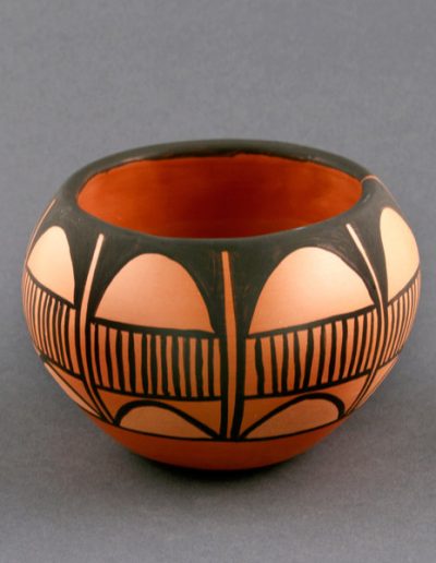 Black-on-red bowl by Ray Garcia, clay and paint, 2012