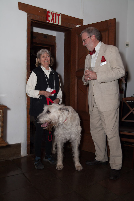 Susan McGreevy and wolfhound greeted by pesident Michael Brown at 2016 SAR party