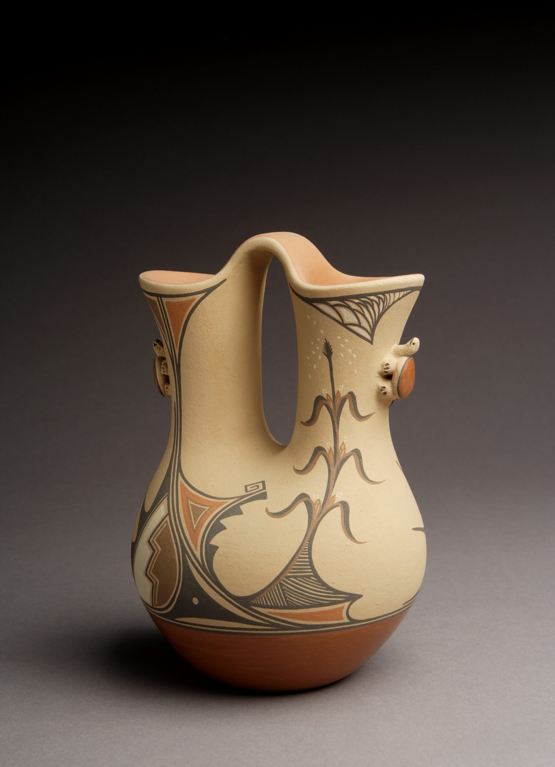 Wedding Vase, Laura Gachupin (Jemez Pueblo), 1980, clay, paints, 8 ¾” x 5 5/16”. Cat. no. SAR.1989-7-293. Photo by Addison Doty.
