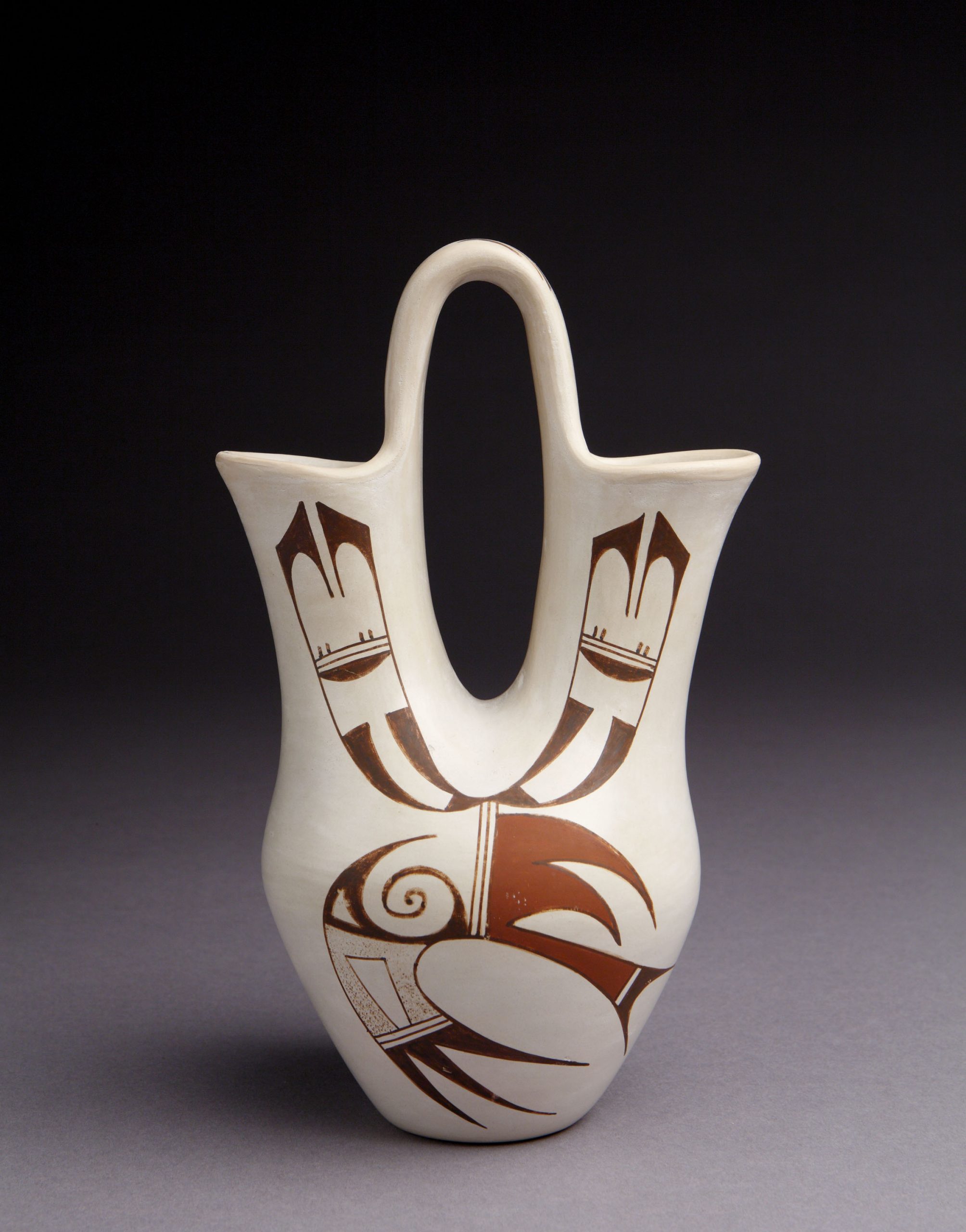 Vase, Joy Navasie (Hopi-Tewa Pueblo), c. 1965, clay, paints, 8 7/16” x 5 1/16”. Cat. no. SAR.1989-7-309. Photo by Addison Doty.