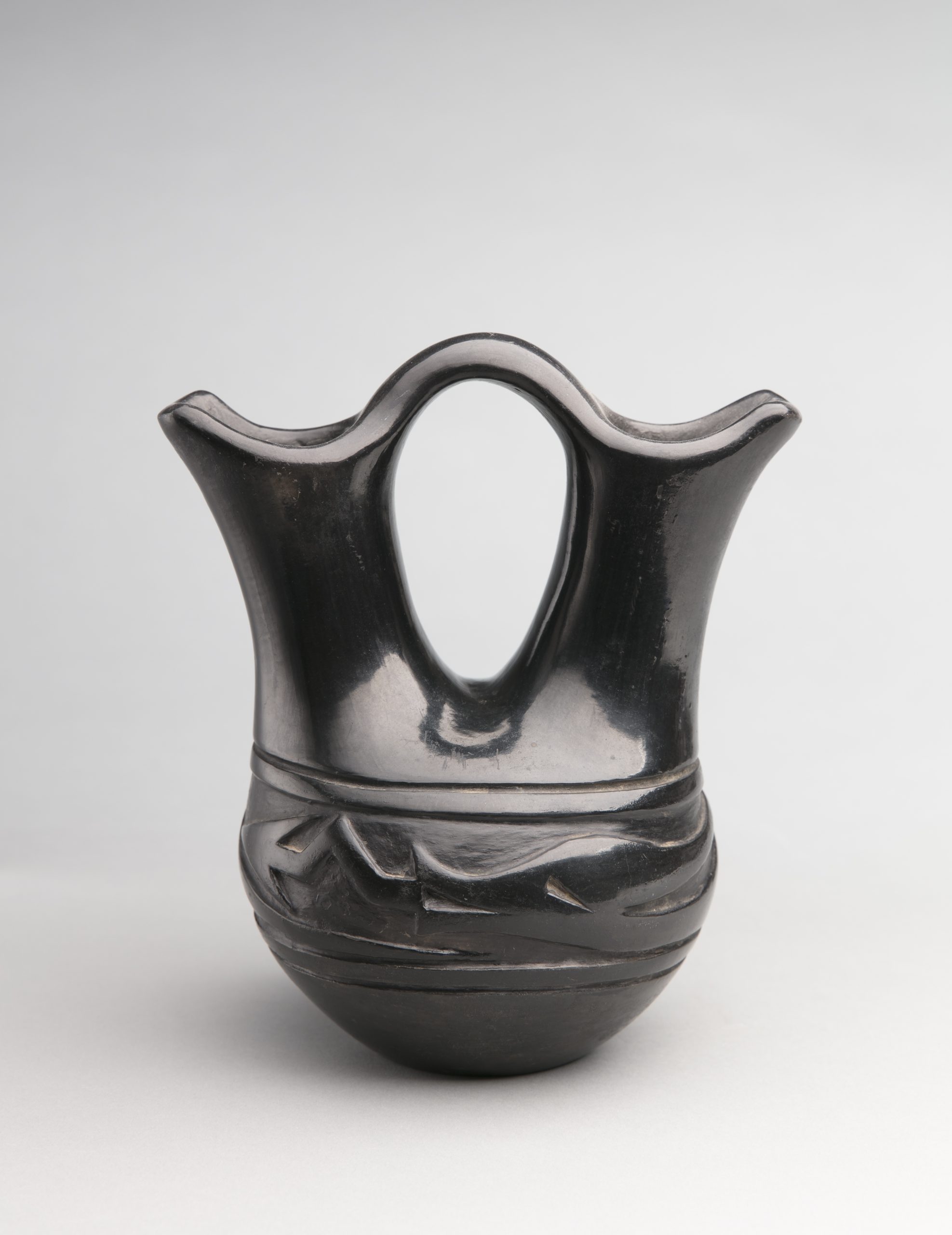 Wedding Vase, Severa Tafoya (Santa Clara Pueblo), before 1973, clay, 8 7/16” x 7 ½”. Cat. no. SAR. 1981-26-14. Photo by Addison Doty.