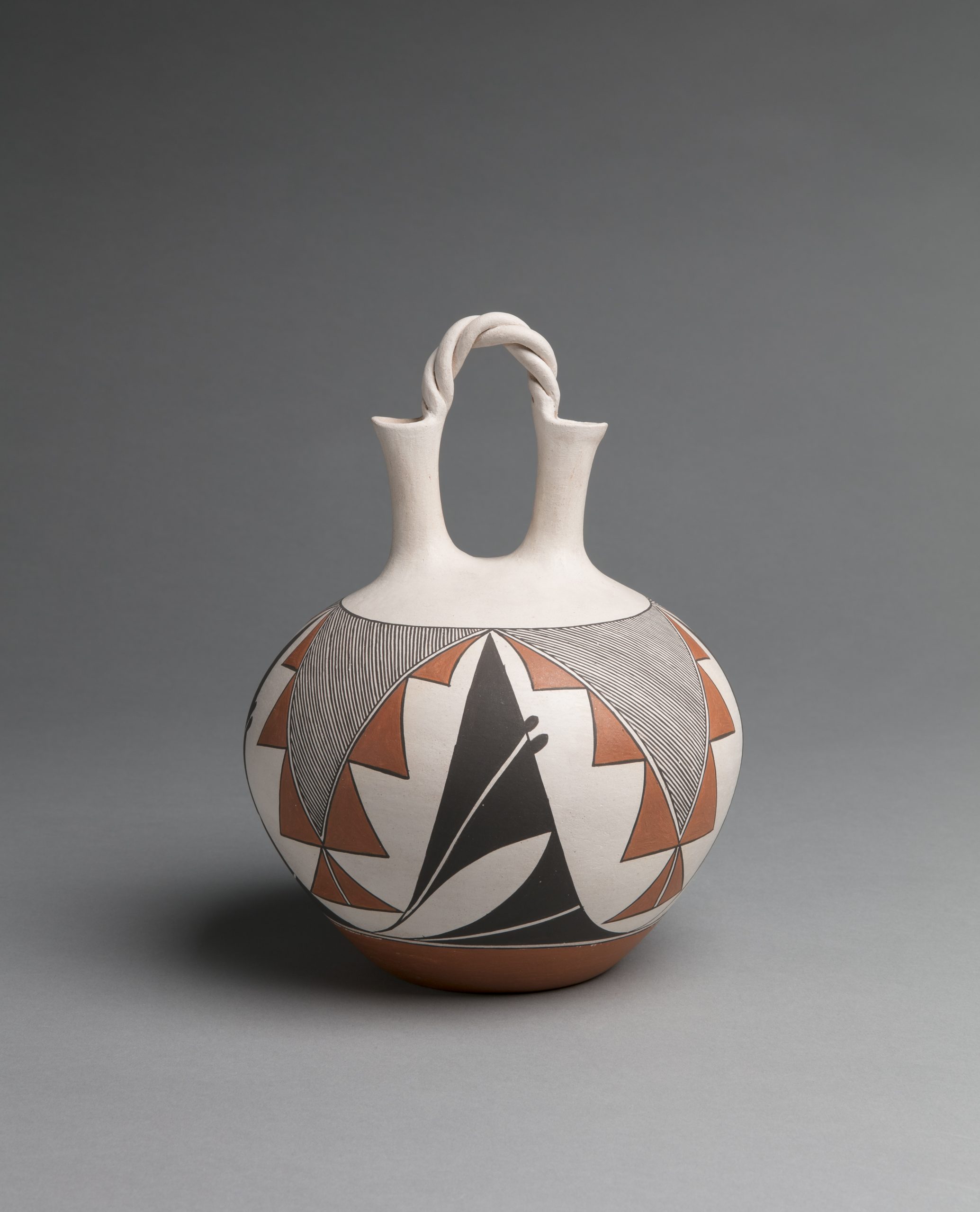 Wedding Vase, Evelyn Cheromiah (Laguna Pueblo), 1980-1989, clay, paints, 9 7/16” x 7 1/16”. Cat. no. SAR.1994-4-534. Photo by Addison Doty.